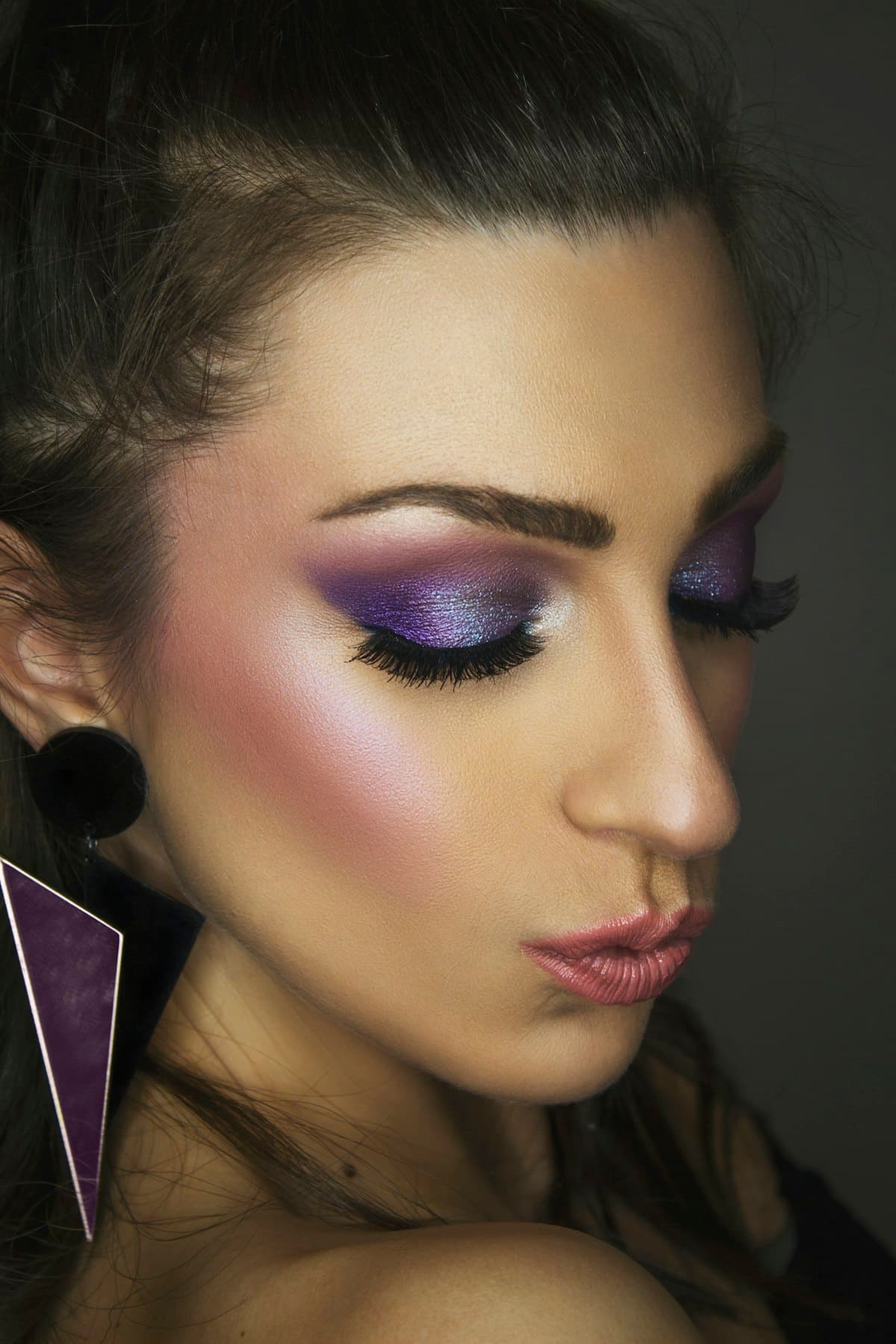 Editorial beauty close-up with graphic lash detail